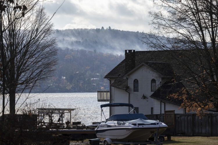 Fire crews on both US coasts battle wildfires